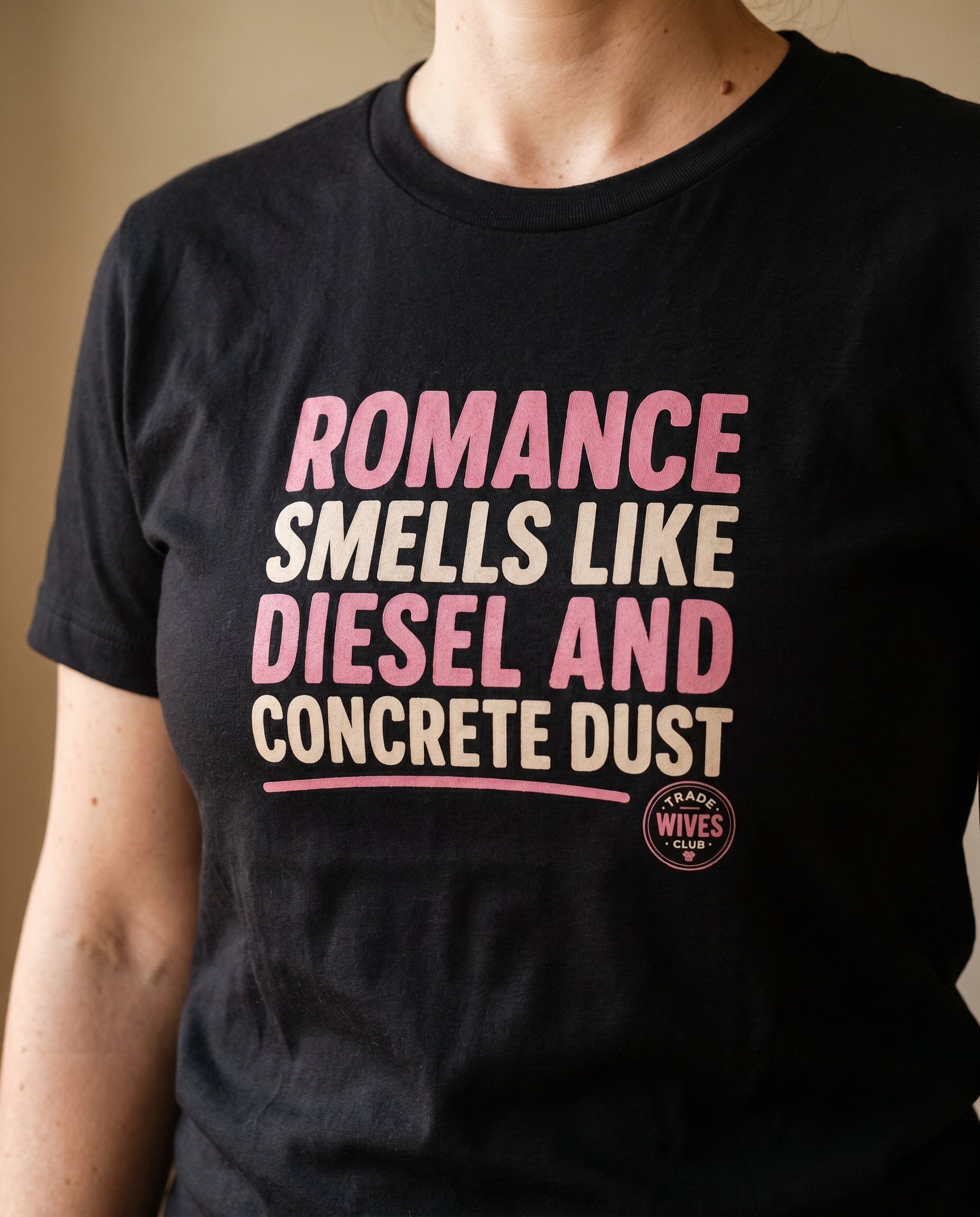 Romance Smells Like Diesel & Concrete Dust tee — Tradie Wives Club — detail shot